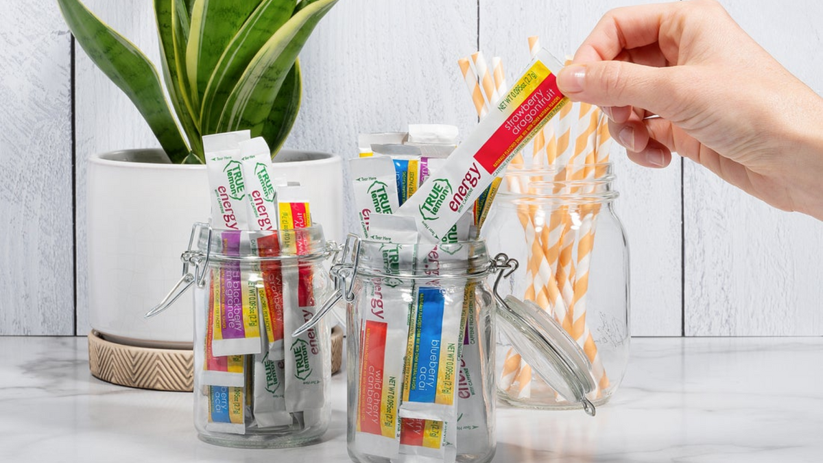 True Lemon Energy, a coffee alternative that saves you money, in jars on a kitchen counter.